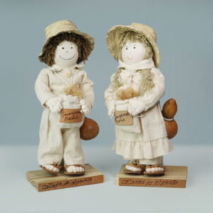 Boneca catadora e catador de algodão